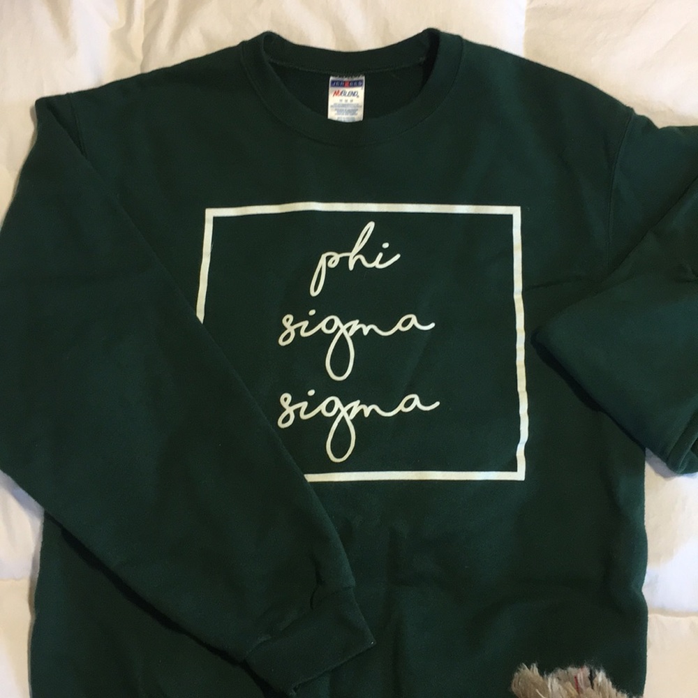 Green crewneck.